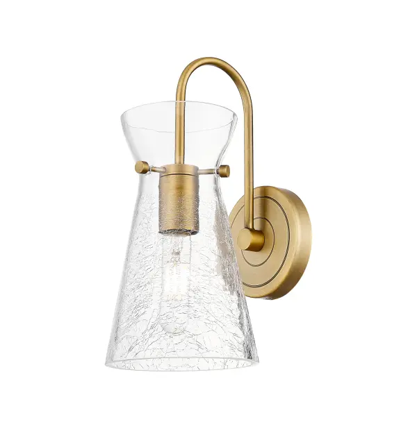 The Nicole is a modern industrial collection that incorporates exceptional architectural details and an equally striking cone shaped shade. The geometric shape of the glass or metal shade give this collection a charming and timeless presence. For a bathroom light choice that stands out, look no further than the Nicole sconce.