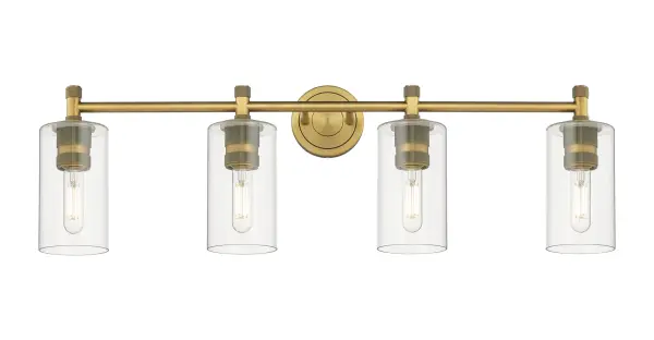 Details abound in the Crown Point Collection with an industrial take on modern sophistication. This stunning line of fixtures features cylindrical glass set in an updated restoration style frame with intricate knurling detail on the sockets, canopy, and finials. - alternate view
