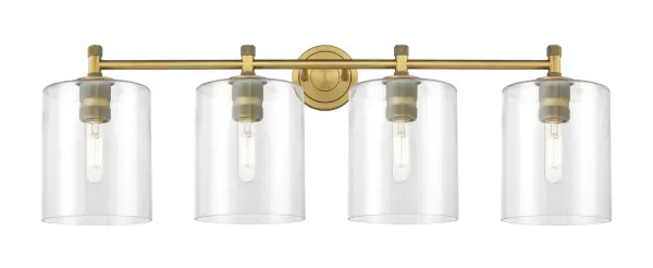 Details abound in the Crown Point Collection with an industrial take on modern sophistication. This stunning line of fixtures features cylindrical glass set in an updated restoration style frame with intricate knurling detail on the sockets, canopy, and finials.