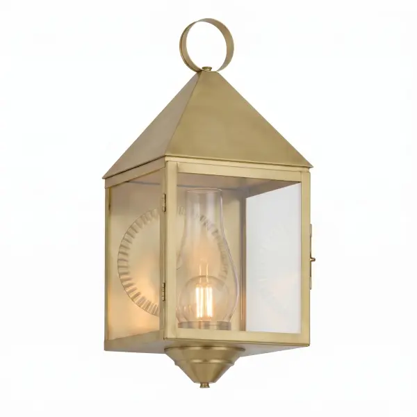 THE ASHFORD COLLECTION’S tapered silhouette, pyramid roof, and hand-finished frame capture the elegance of traditional lanterns. Crisp lines give it a refined, architectural edge for any home. Available in various sizes and finishes, it bridges historic charm and modern living with a warm, inviting glow.