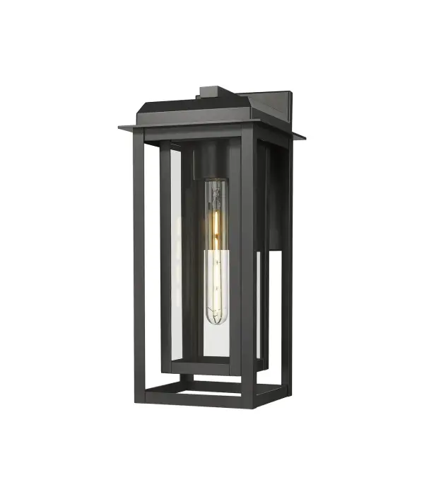 The Mansfield Collection brings architectural elegance and modern versatility to your outdoor spaces. Its strong matte black aluminum frame is paired with an inset inner frame—offered in brass, silver, or black—creating a layered design that draws the eye and elevates curb appeal. Clear, seedy, or water glass options let you customize the ambiance, whether you want crisp illumination or a softly diffused glow. Built to last in all seasons, Mansfield is available in post, pendant, and sconce styles in three sizes, making it effortless to coordinate across your entire exterior. The combination of refined geometry, mixed materials, and durable construction ensures Mansfield feels equally at home in both contemporary and transitional settings.
