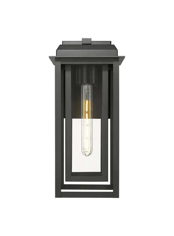 The Mansfield Collection brings architectural elegance and modern versatility to your outdoor spaces. Its strong matte black aluminum frame is paired with an inset inner frame—offered in brass, silver, or black—creating a layered design that draws the eye and elevates curb appeal. Clear, seedy, or water glass options let you customize the ambiance, whether you want crisp illumination or a softly diffused glow. Built to last in all seasons, Mansfield is available in post, pendant, and sconce styles in three sizes, making it effortless to coordinate across your entire exterior. The combination of refined geometry, mixed materials, and durable construction ensures Mansfield feels equally at home in both contemporary and transitional settings. - alternate view