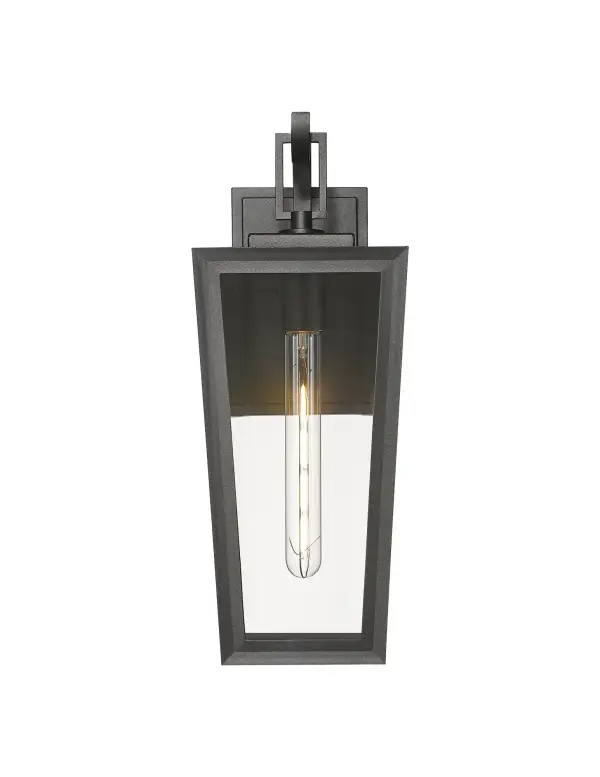 The Madison Collection captures the timeless beauty of classic lantern design, reimagined with coastal durability. Its tapered frame, gently curved arm, and oversized loop detail create a graceful silhouette that feels at home on a seaside porch or a sophisticated city entryway. Glass panels allow the light to shine bright and true, showcasing the filament bulb within, while the Coastal Rating ensures lasting performance in salty air and harsh weather. Whether mounted in multiples along a walkway or flanking a front door, Madison offers a warm welcome with enduring style and strength. - alternate view