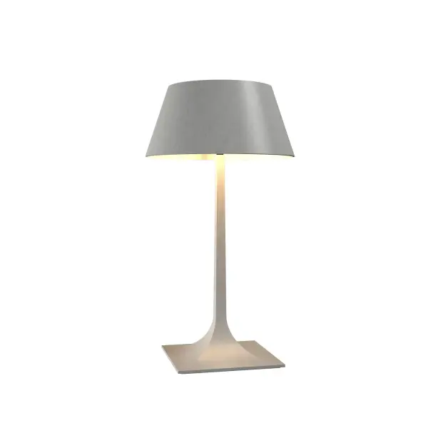 The Nostalgia Table Lamp brings a refined organic aesthetic to any space with its clean white finish and compact 14-inch height. Perfect for creating ambient lighting in bedrooms, living areas, or offices.